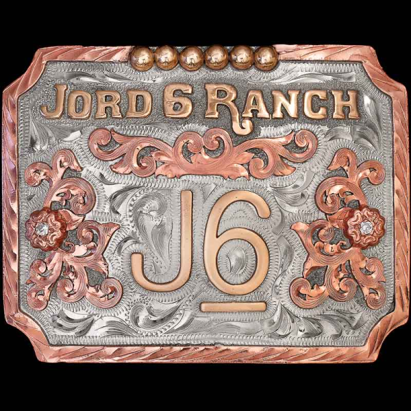 The Rawlins Belt Buckle is the right choice to showcase your custom logo, ranch brand or initials! Featureing a hand engraved silver base with copper scrollwork and bronze lettering. Personalize this design today!